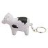 A stress cow key ring in white with black spots, featuring a silver metal chain for attachment.