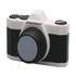 A stress toy shaped like a camera, featuring black and white colours with a round lens. It has a logo on its surface.