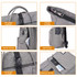 A grey Adventure Laptop Backpack with various pockets, top carry handles, and zip closures. Features a logo.