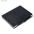 A black notebook with a textured cover, spiral binding, and a pen holder. Pen not included.