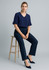 Navy women's slacks with a cool stretch adjustable waistband, paired with a matching navy top and heels.