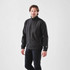 A man wearing a black Men's Cirrus Bonded Jacket, featuring a zip front and side pockets, with a logo on the sleeve.