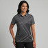 A women's polo shirt in grey with a geometric pattern and a collar. It features a logo on the chest area.