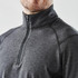 A 1/4 zip pullover in dark grey with a smooth finish and a high collar. Features a branding logo.