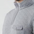 A grey men's thermal 1/4 zip pullover with a chest pocket and a soft, textured fabric. Features a logo on the chest.