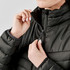 A black Montserrat thermal jacket with a high collar, featuring a zippered closure and elastic cuffs.