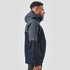 A navy blue men's rain jacket with a hood, featuring a zippered front and side pockets, alongside a model.