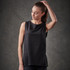 A woman wearing a black tank top with a sleek design, featuring an unobtrusive logo.