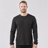 A black crew neck shirt worn by a man, featuring long sleeves and a plain design with a logo.