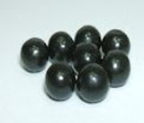 Small Black Chinese Teapills, enlarged for detail