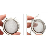 Tea ball strainer opens easily and has a locking mechanism