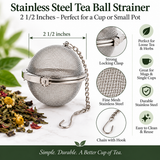 Stainless steel 2.5-inch locking tea ball strainer featuring fine mesh, a secure clasp, and chain with hook. Designed for steeping loose-leaf tea and cut herbs in mugs, individual cups, or small teapots. Reusable and easy to clean.