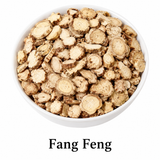 Organic Fang Feng Root (Saposhnikovia divaricata), also known as Siler Root and Ledebouriella Root, displayed as cut root slices in a white bowl. Traditionally used in Chinese herbalism and commonly found in classic herbal formulas.