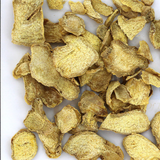 Bulk sliced ginger root for traditional herbal remedies and culinary use.