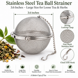 Large 3.6-inch stainless steel tea ball strainer featuring a strong locking clasp, fine mesh construction, and chain with hook. Designed for steeping loose-leaf tea, cut herbs, roots, bark, berries, and herbal blends in a teapot.