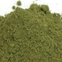 Mint powder in wooden bowl with fresh mint leaves for herbal tea, smoothies, cooling wellness drinks, and natural herbal preparation