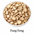 Organic Fang Feng Root (Saposhnikovia divaricata), also known as Siler Root and Ledebouriella Root, displayed as cut root slices in a white bowl. Traditionally used in Chinese herbalism and commonly found in classic herbal formulas.