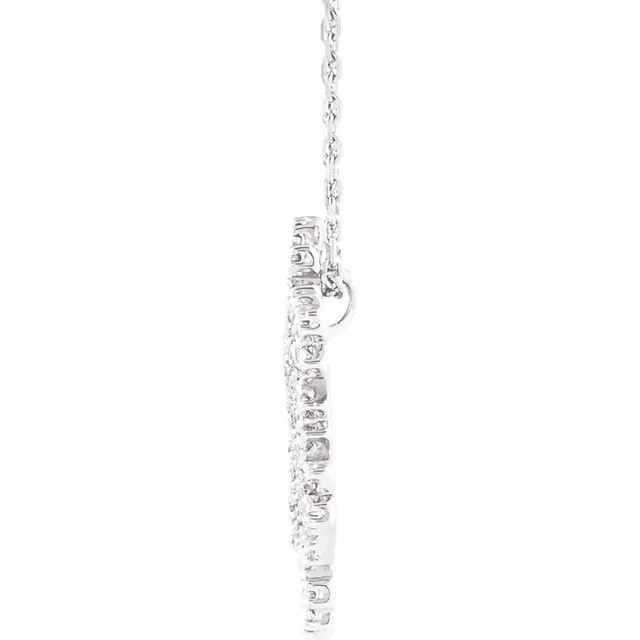 This beautiful and modern diamond pendant for women features brilliant-cut bright round diamonds set in a sparkling 14kt white gold prong setting. This nature themed pendant is uniquely shaped as a snow flake.