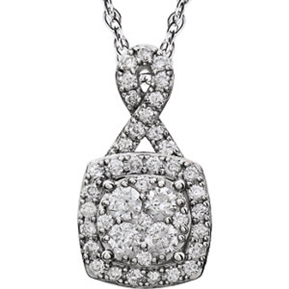 Beautiful 14Kt white gold halo-style necklace featuring white shimmering diamonds with 3/4 carats of diamonds hanging from a 18" inch chain which is included. 