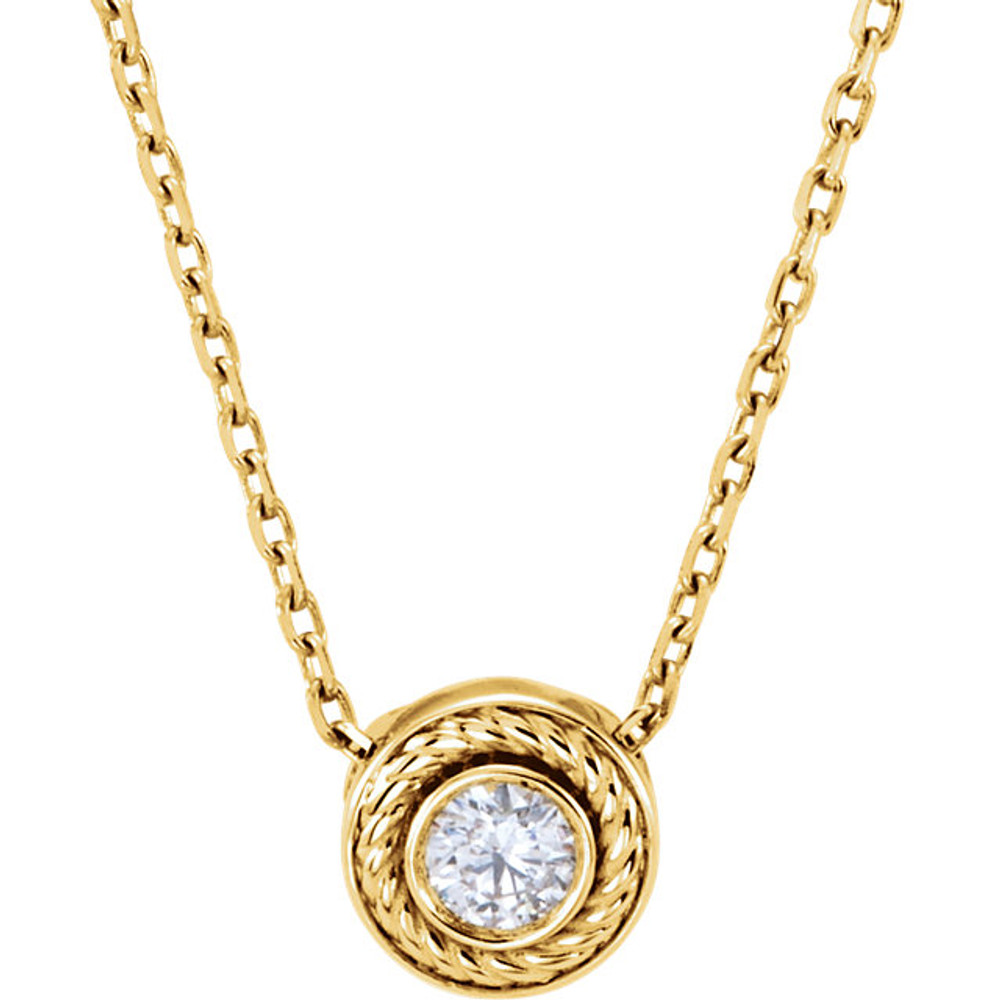 The necklace features a round rope sliding pendant with a 1/10ctw diamond in the center. Diamonds are 1/10ctw, G-H in color and I1 or better in clarity.