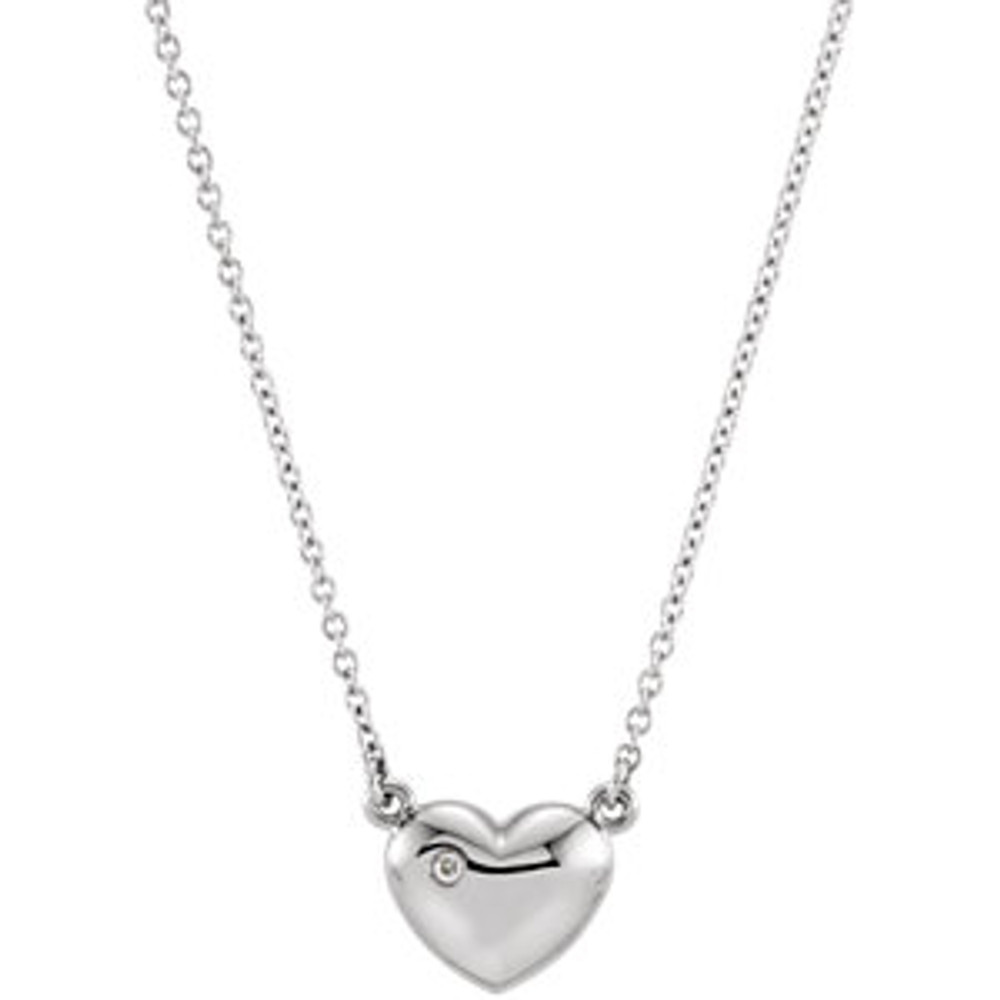 This pendant features a romantic heart with a genuine round cut diamond. Diamonds are .01ctw, G-H in color, and I1 or better in clarity. Pendant is presented on an 16.50 inch solid cable chain.