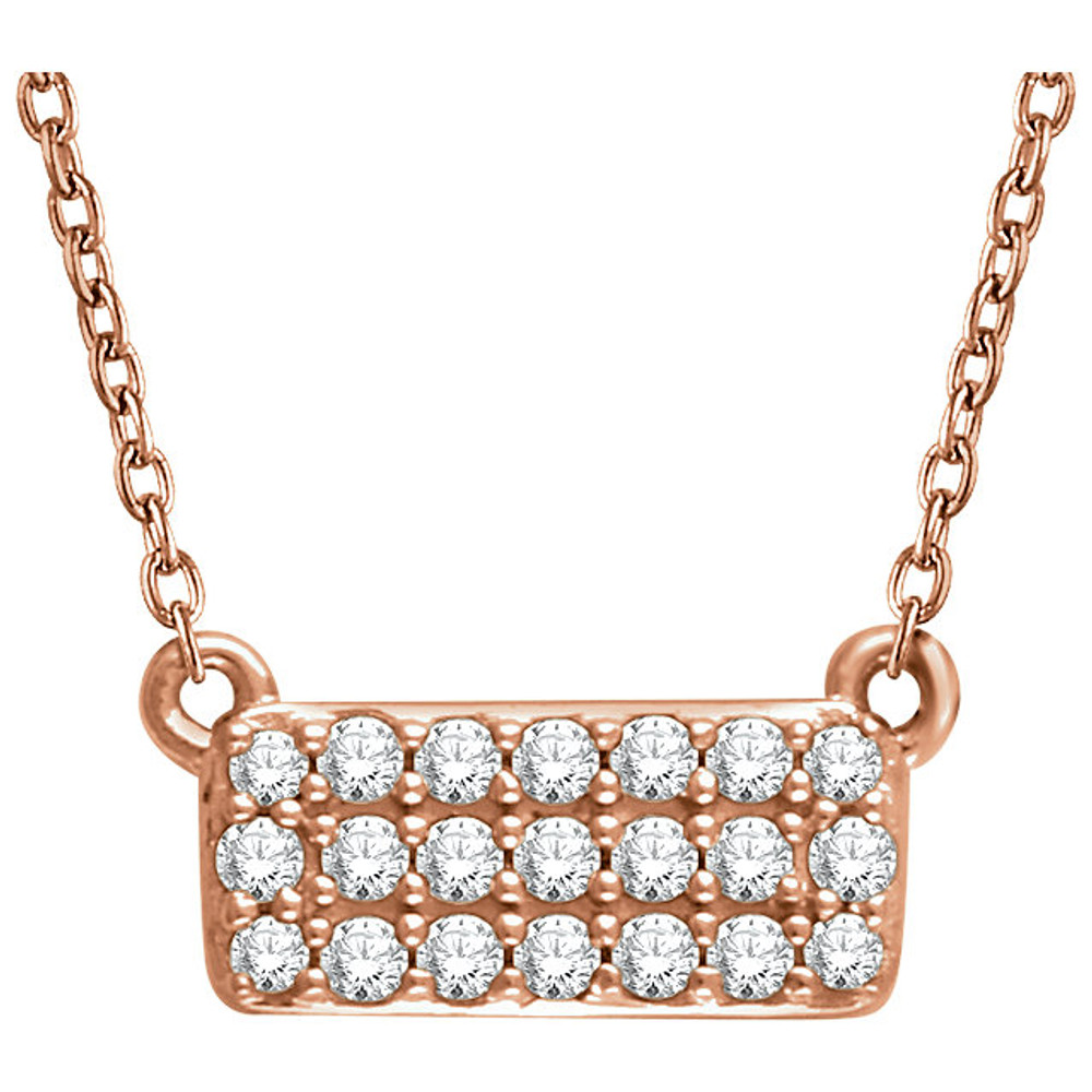 Diamond Rectangle Cluster 18" Necklace, this dazzling diamond pendant complements any attire. Fashioned of sparkling 14k gold, the pendant features 21 round cut diamonds. The rectangular shape adds a sophisticated element to this gorgeous 1/6ctw diamond piece.