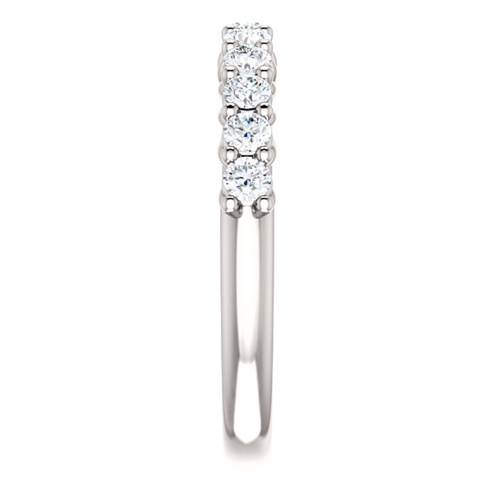A happy reminder. This diamond anniversary band will ensure your spouse knows how much you care. The satisfying diamonds and gold will complement any style. Take the moment to say some kind words—what you mean to say every day.

    11 diamonds means lots of shine.
    14K white gold shank.
    Designed to be strong for years to come.
    Classic—looks great throughout the trends.

Sheer happiness. When you slip this diamond anniversary band on, your love won't have to tell you how perfect it is. The 5/8 ct. tw. diamonds have a very good cut and round shape which guarantees they'll sparkle. They also have an G-H color, SI2-SI3 clarity rating. The ring is cast in 14K white gold that creates a definitive look.