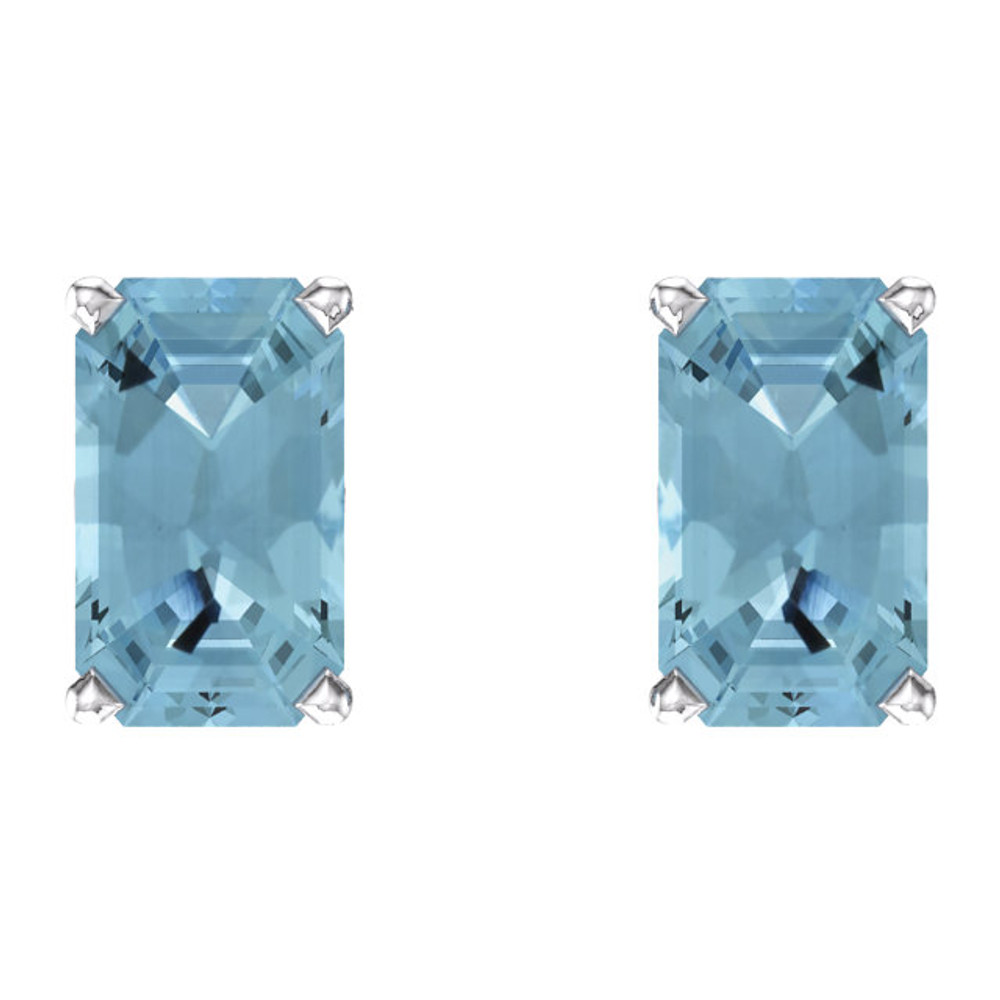 These lovely 14k white gold earrings each feature a genuine 5 x 3mm Emerald/Octagon aquamarine. Polished to a brilliant shine.