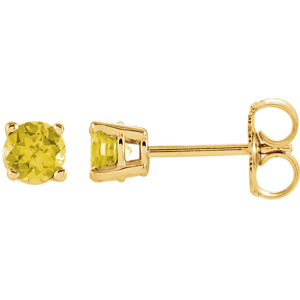 Deeply rich in color, these yellow sapphire earrings are complemented by 14k yellow gold four-prong settings and make a simply striking gift.