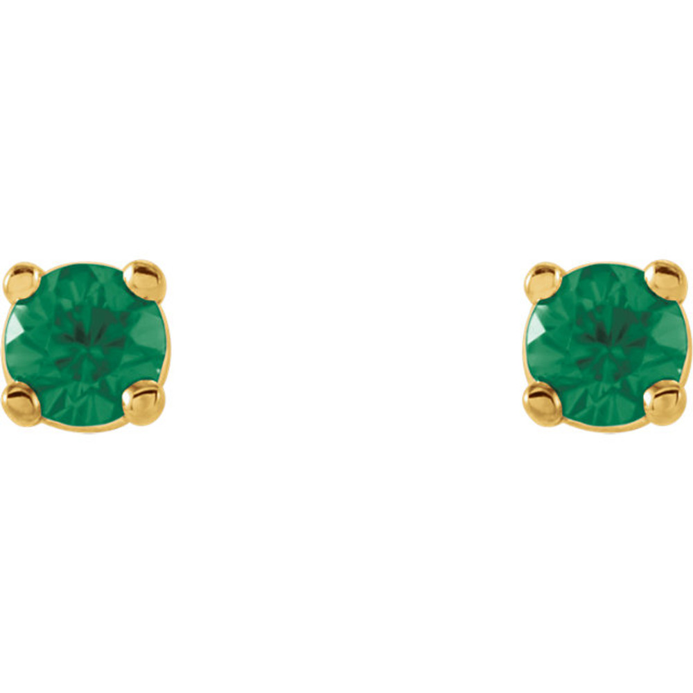 Straightforward in design and unmatched with color, these round-shaped emerald stud earrings are ideal for everyday wear. Brilliant green hues shine through as the 2.5mm gemstones are cradled in four-prong settings. Each eye-catching earring rests on a 14K yellow gold post secured with a friction closure. Emerald is May's precious and romantic birthstone.