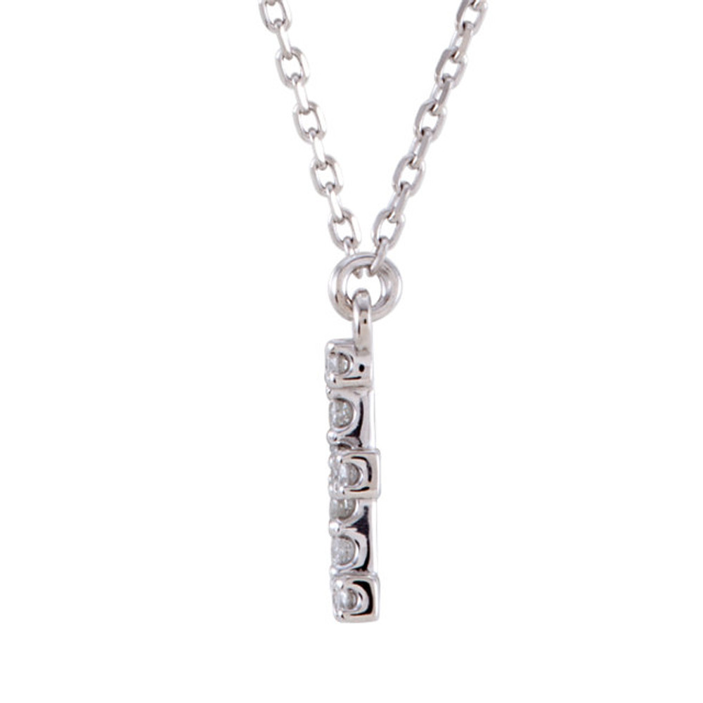 The letter "E" Diamond charm suspended from a delicate 16" diamond cut cable chain creates a personalized necklace in 14K Gold. Sparkling with 1/6 ct. t.w. of diamonds and a bright polished shine.