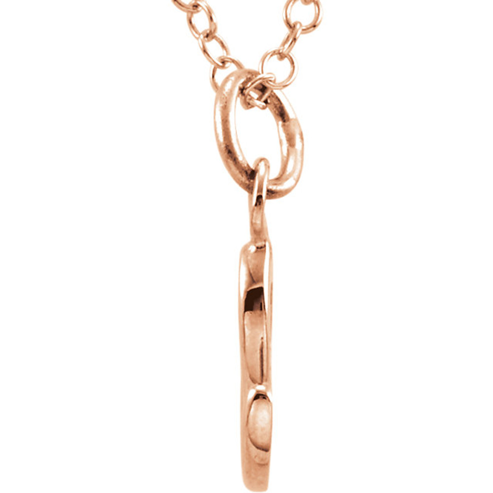 Express your individuality with this beautiful, lower case script initial necklace rendered in polished 14k gold. The petite pendant is approximately 7.60mm in width. The 1.3mm open cable chain closes with a lobster clasp and is 18 inches in length.