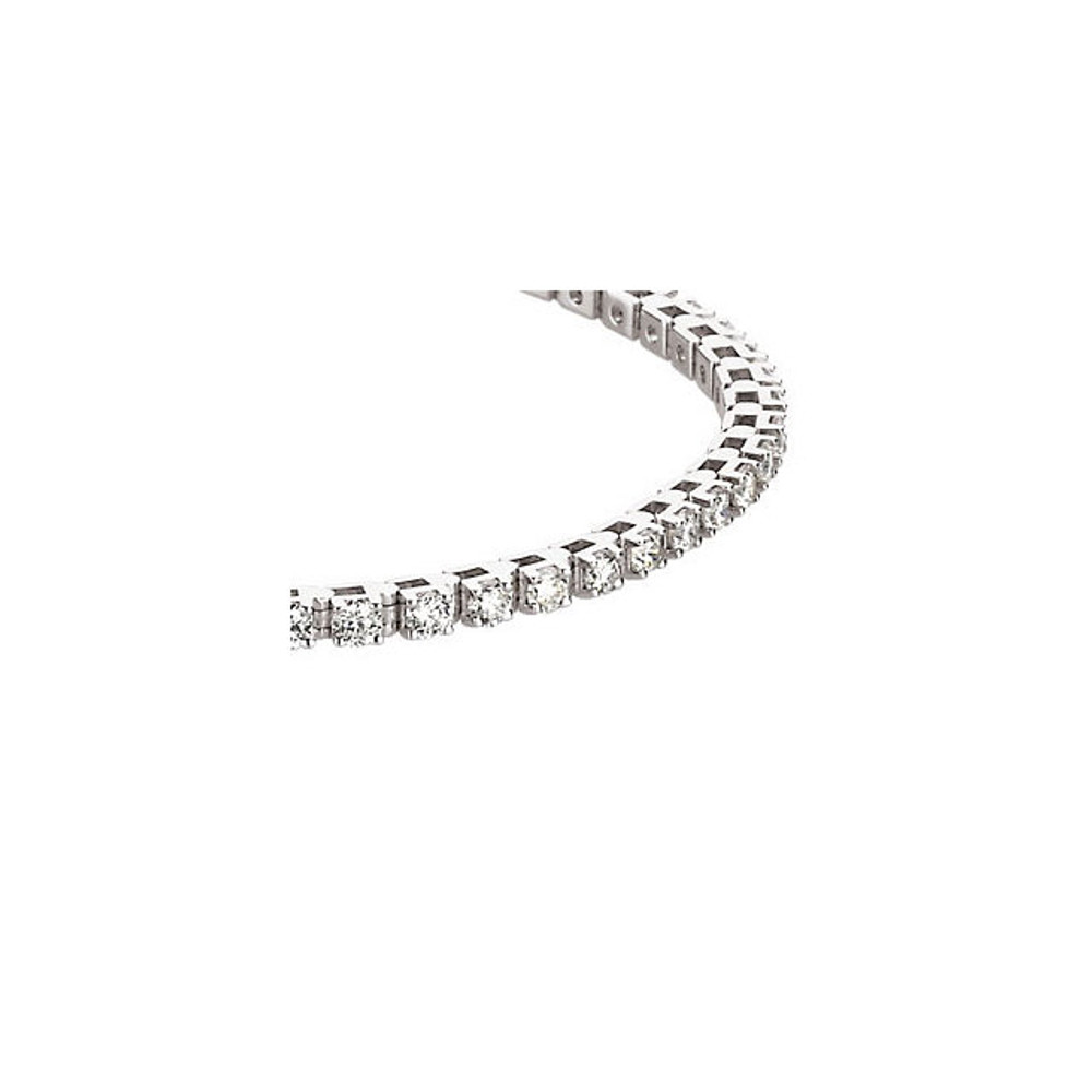 This stunning 14k white gold diamond tennis bracelet is a jewelry box essential with a timeless and classic look that will never go out of style! The bracelet sparkles and shines with 49 round diamonds that are 3 3/8ctw, G or better in color, and I1 in clarity. Bracelet is 7 inches in length. 