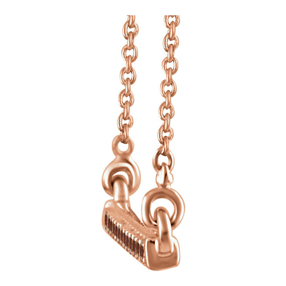 Raise the fashion bar with this elegant and eye-catching necklace. Expertly crafted In 14K rose gold, this straight bar-shaped design features shimmering sparkling diamonds. A simple-yet-sophisticated look she's certain to adore, this necklace captivates with 1/6 ct. t.w. of diamonds and a polished shine. The look suspends centered along an 18.00-inch chain that secures with a spring ring clasp.