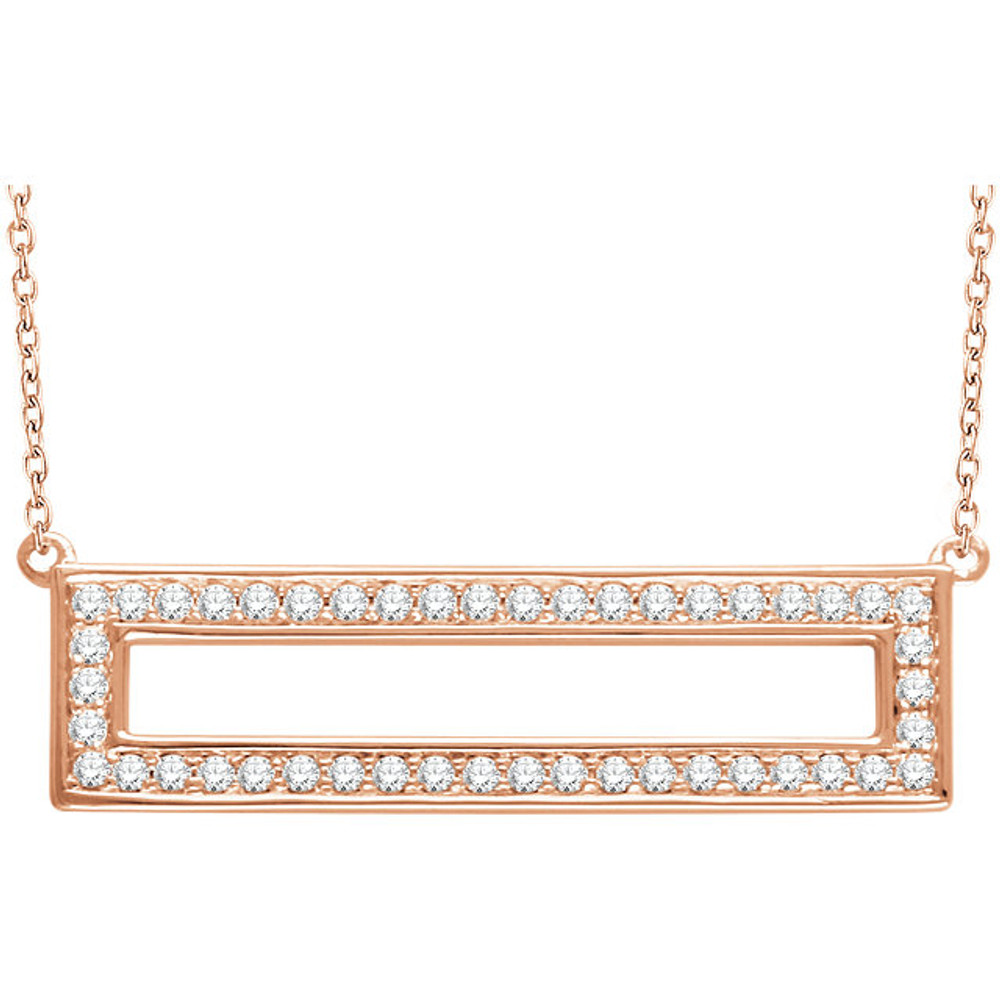 Beautifully crafted of 14-karat gold, this lovely open rectangle pendant sparkles with 3/8 carat of genuine, round diamonds. The pendant hangs from an 18-inch gold cable chain that secures with a spring ring clasp.