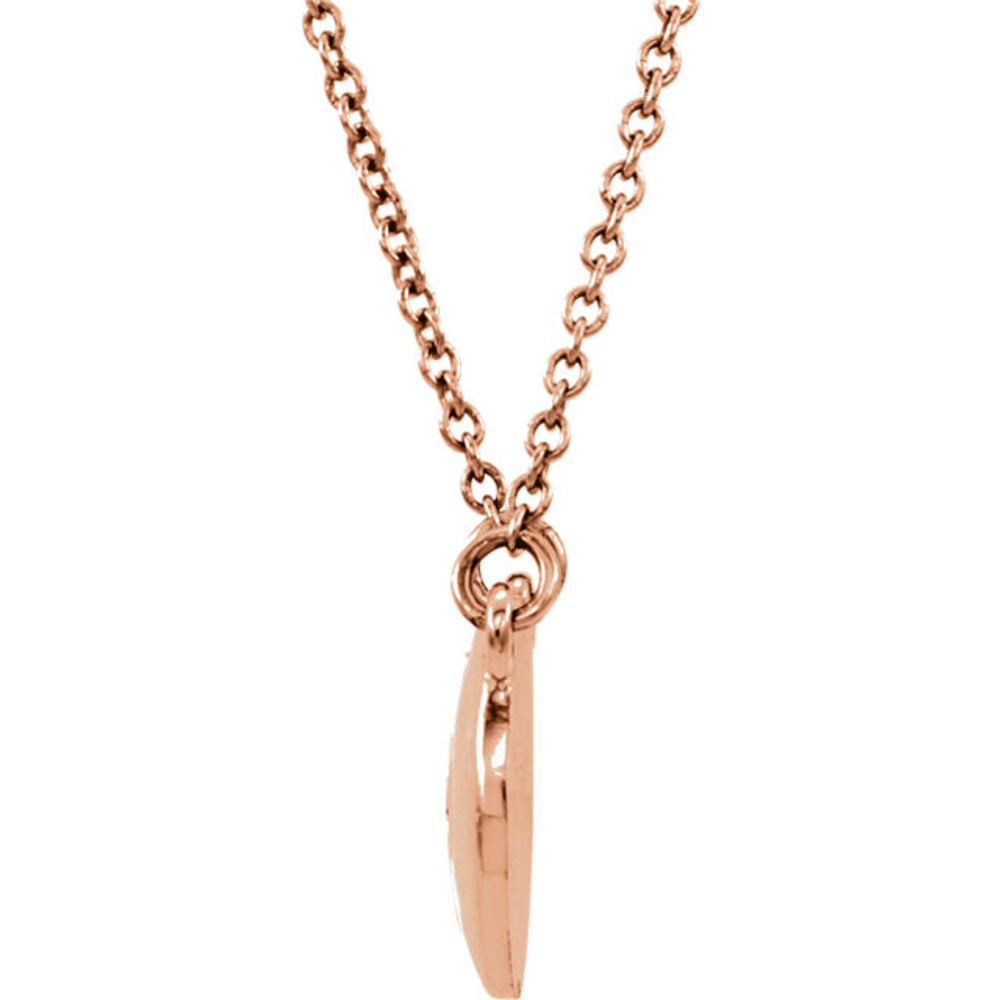 This pendant features a .02 round diamond set in 14k gold. Diamond is G-H in color and I1 or better in clarity. Pendant is 11.55mm in length and 9.70mm in width. 16.5" 14k gold chain is included.