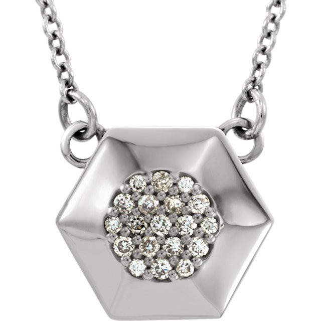 This pendant features a .08 round diamonds set in 14k gold. Diamond is G-H in color and I1 or better in clarity. Pendant is 10.00mm in length and 10.82mm in width. 16.5" 14k gold chain is included.