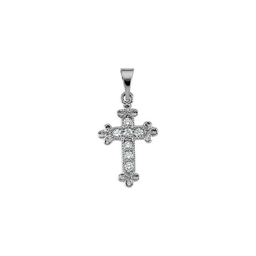 Absolutely adorable, this diamond cross pendant is sure to be noticed. A dainty cross motif provides grace and movement to this elegant, pendant. A traditional cross is rendered in dazzling 14k gold with diamonds giving a gorgeous look. Polished to a brilliant shine.