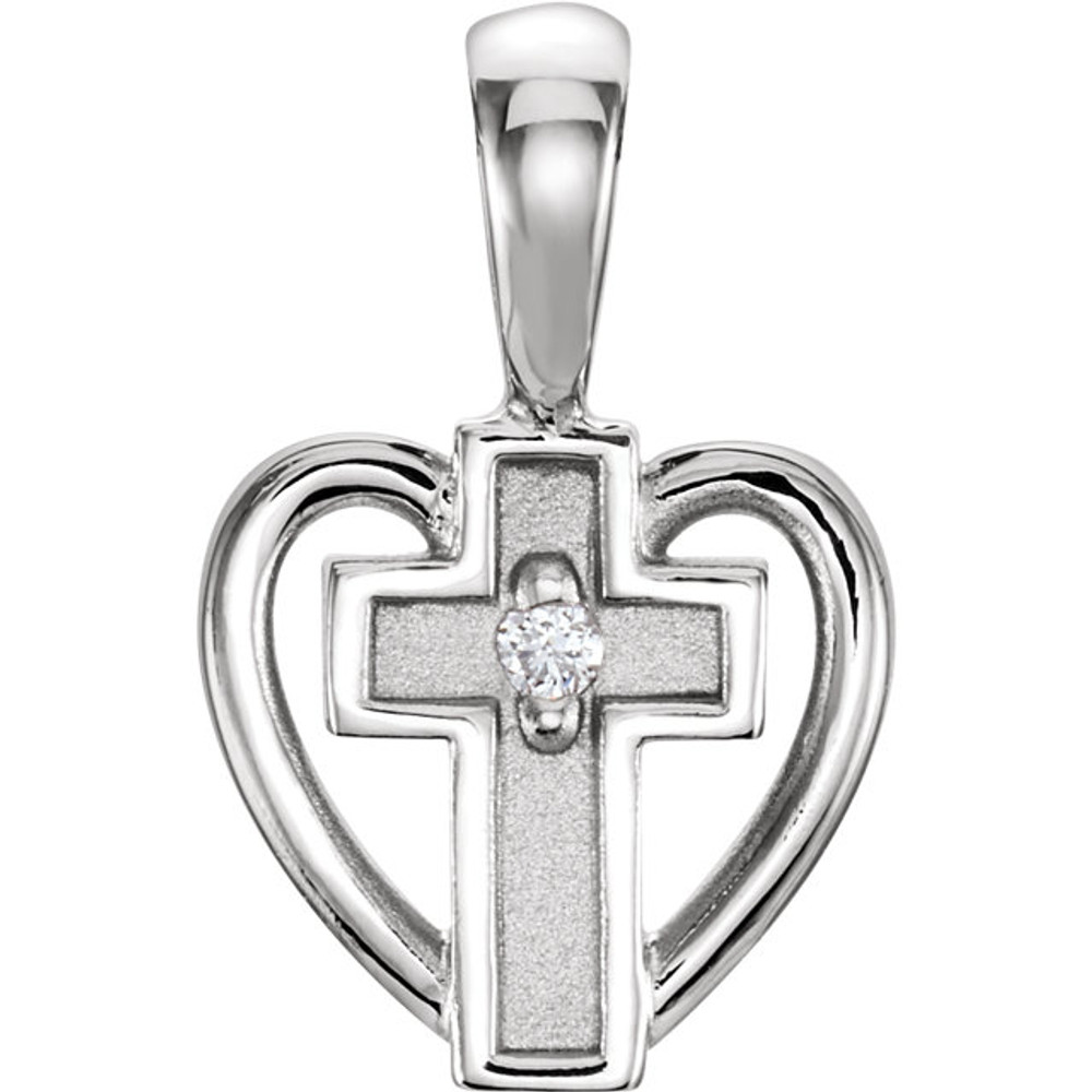 Grace yourself with this beautiful diamond pendant. A heart and cross design adorned with a round-cut diamond creates a heartfelt look. 