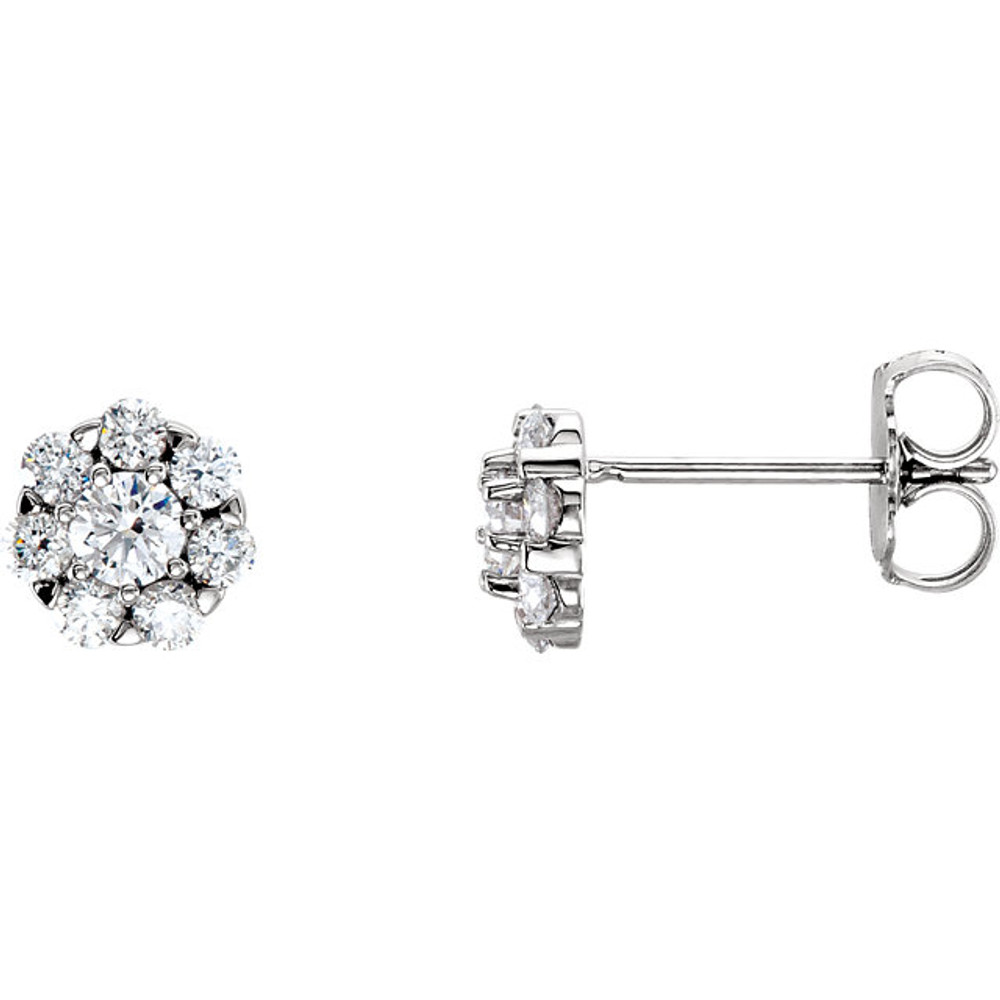 Exceptional brilliance of enormous proportions. Slightly domed to catch light from every direction, these diamond cluster earrings make a stunning impression at first and second glance.