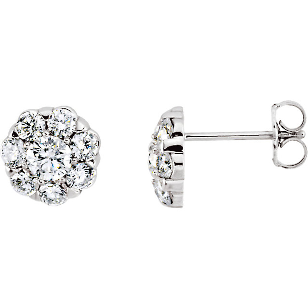 Exceptional brilliance of enormous proportions. Slightly domed to catch light from every direction, these diamond cluster earrings make a stunning impression at first and second glance.