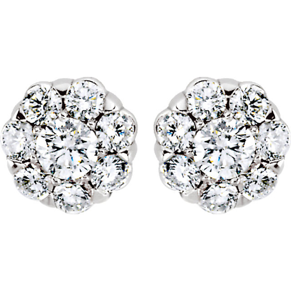 Exceptional brilliance of enormous proportions. Slightly domed to catch light from every direction, these diamond cluster earrings make a stunning impression at first and second glance.