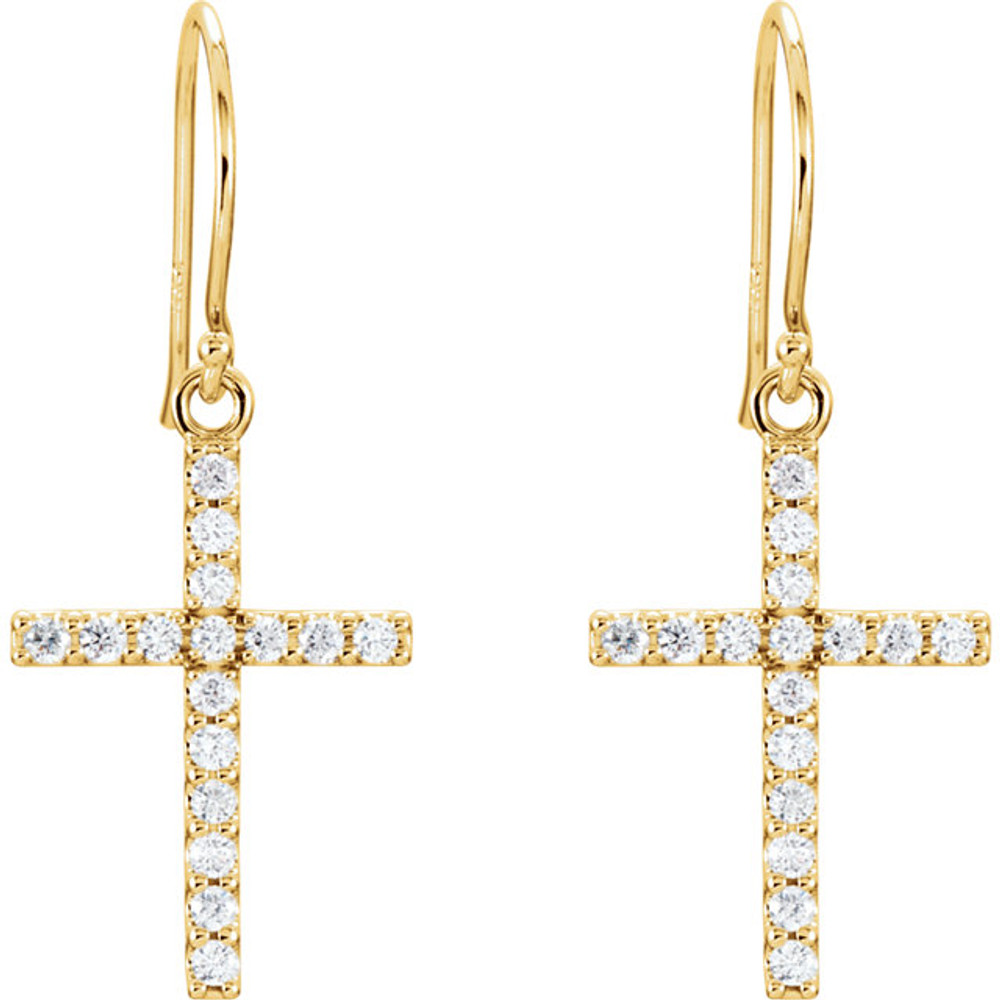 Celebrate faith. The sparkle of this cross pendant emits radiance through prong-set diamonds totaling 1/2 ct. tw. A traditional symbol set in 14K yellow gold.