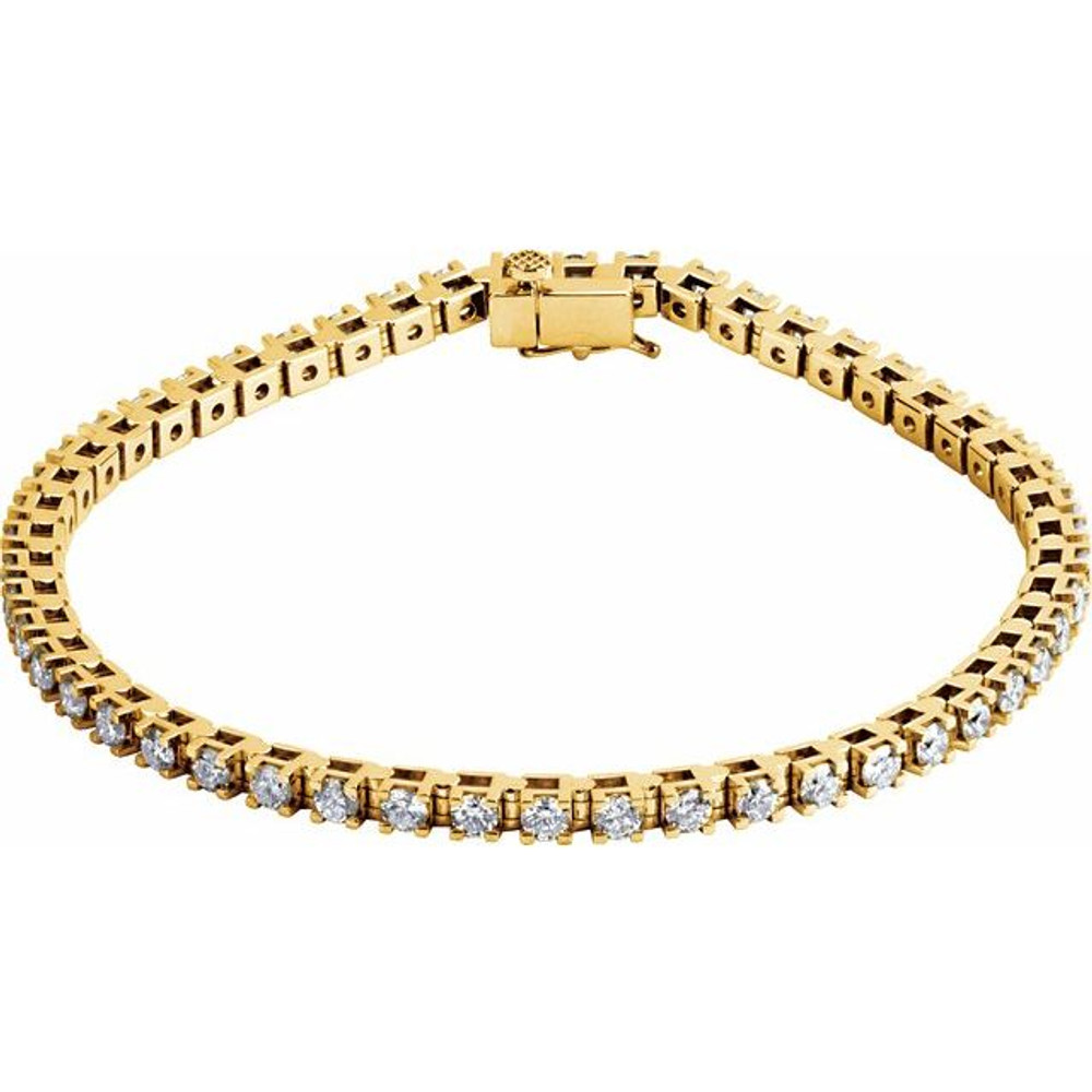 Experience formal elegance in a 3 1/2 ct. t.w. diamond tennis bracelet. This stylish beauty sparkles with round diamonds to marvelous effect. 14kt yellow gold bracelet.