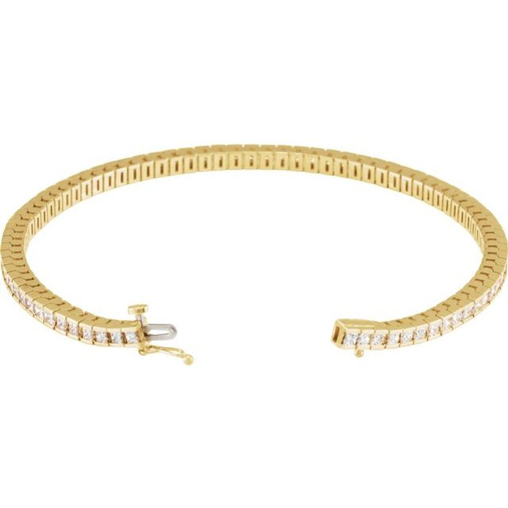 Experience formal elegance in a 4.00 ct. t.w. diamond tennis bracelet. This stylish beauty sparkles with round diamonds to marvelous effect. 14kt yellow gold bracelet.