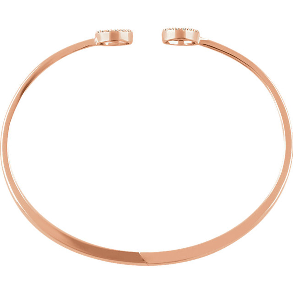 This 14k rose gold diamond circle hinged bangle 7" bracelet will light up your wrist! Diamonds are 1/6ctw, H+ or better in color, and I1 or better in clarity.