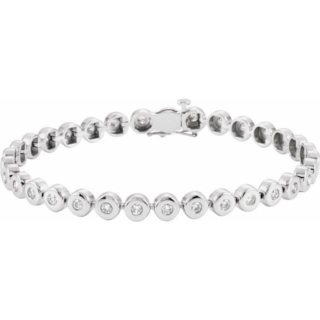Brilliance defined, this diamond tennis bracelet features brilliant cut round diamonds set in 14k white gold.
