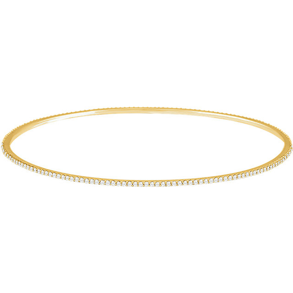 Elegant 14Kt yellow gold diamond bangle bracelet featuring a sparkling display of white round diamonds. Total weight of the diamonds is 1.00cts. Total weight of the gold is 5.75 grams.