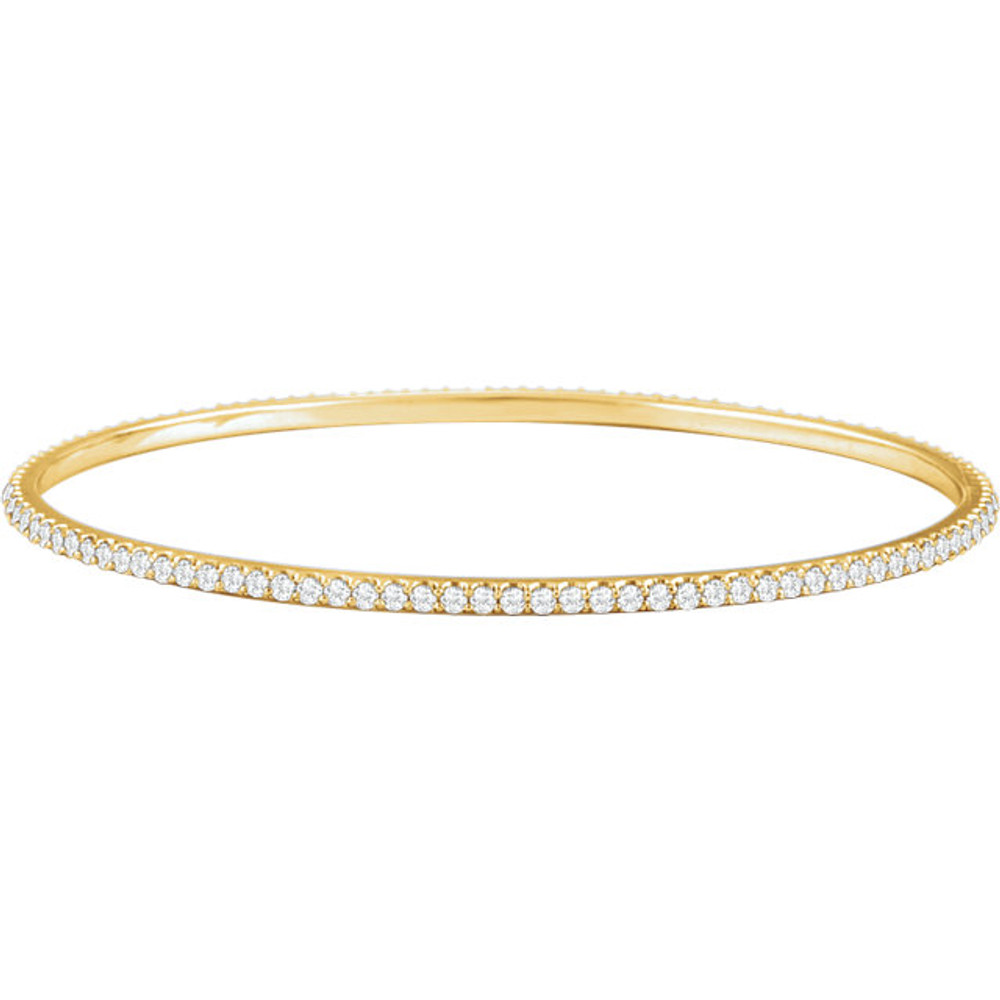 Elegant 14Kt yellow gold diamond bangle bracelet featuring a sparkling display of white round diamonds. Total weight of the diamonds is 3.00cts. Total weight of the gold is 9.05 grams.