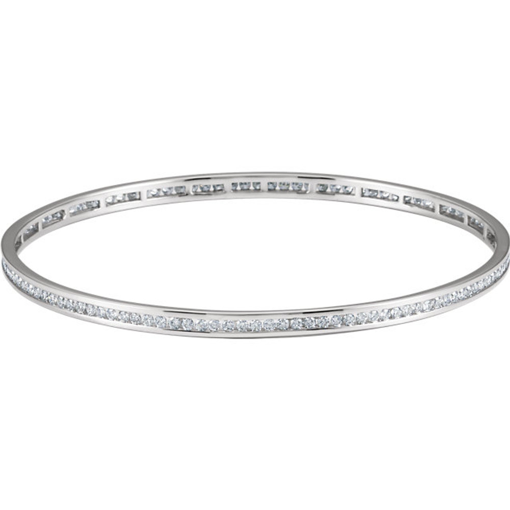Elegant 14Kt white gold diamond stackable bangle 7.5" bracelet featuring a sparkling display of white round diamonds. Total weight of the diamonds is 2 1/4cts. Total weight of the gold is 8.99 grams.